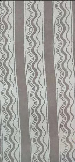 Grey fabric with wavering white stripes.