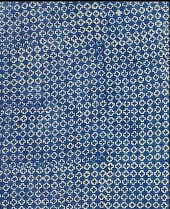 A fine all-over indigo quatrefoil print.