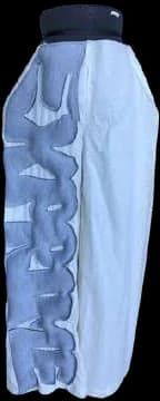 A toile skirt in pale blue quilted fabric.