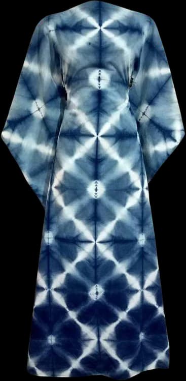 A kaftan dress in an indigo lattice of white bound-resist crosses.